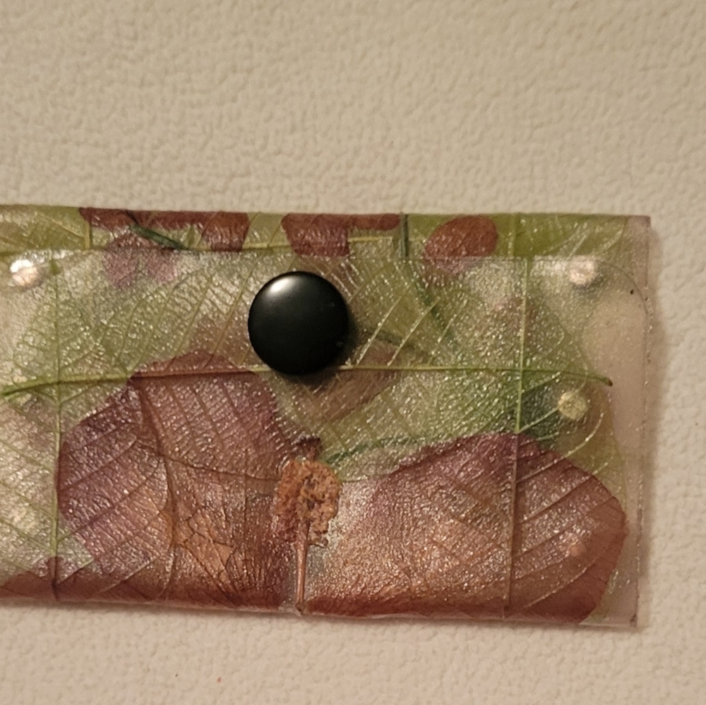 Coin Purse made of Real Leafs Embedded In Flexible Plastic. Snaps Shut.